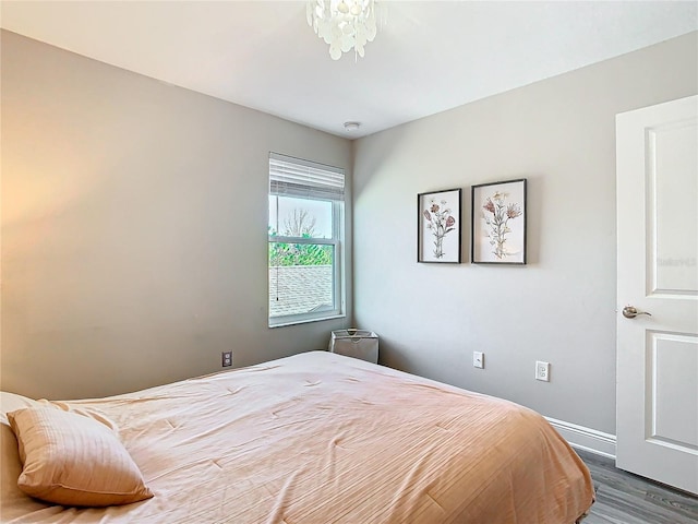 bedroom featuring dark hardwood / wood-style floors