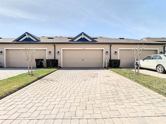 ranch-style home with a garage