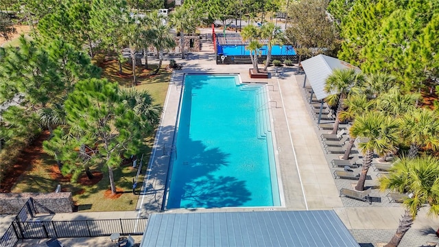 view of swimming pool with a patio