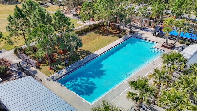 view of swimming pool featuring a patio