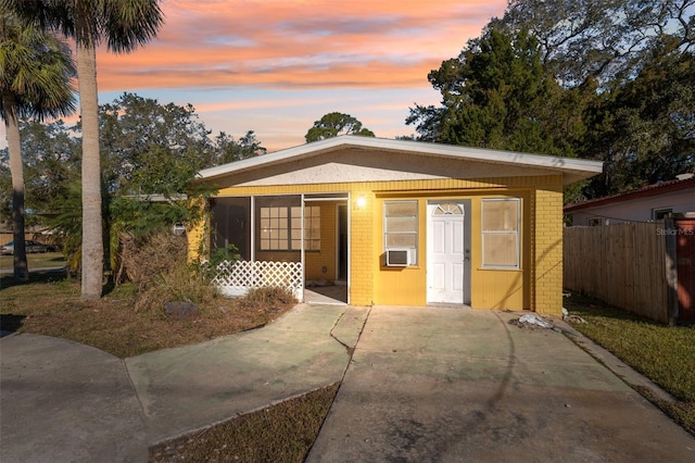 view of front of property featuring cooling unit