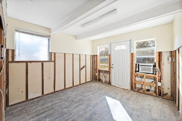 foyer featuring beamed ceiling and cooling unit