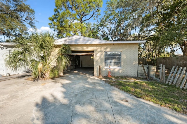 exterior space featuring a carport