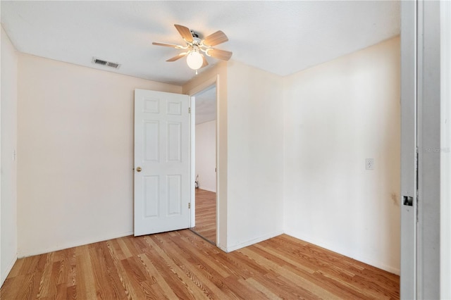 unfurnished bedroom featuring ceiling fan and light hardwood / wood-style floors