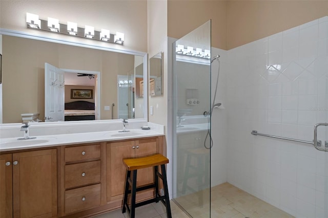 bathroom with walk in shower and vanity