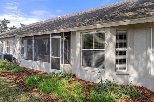 entrance to property with central AC unit