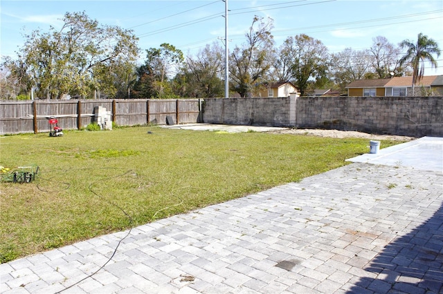 view of yard with a patio area