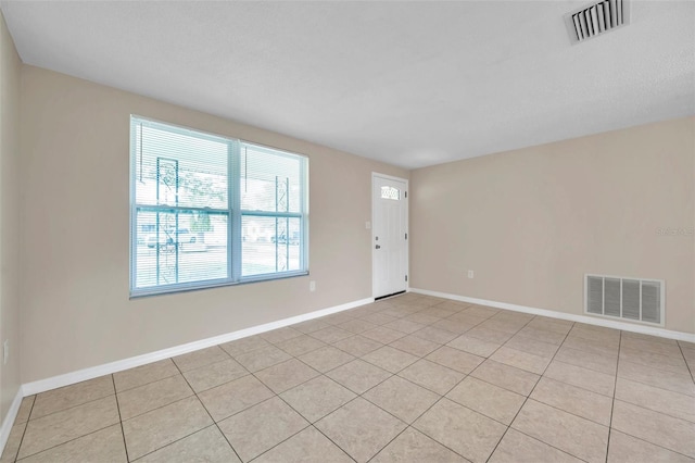 view of tiled empty room