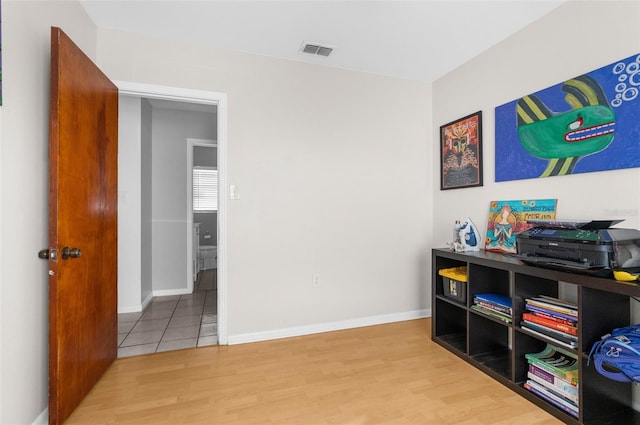 game room featuring hardwood / wood-style floors