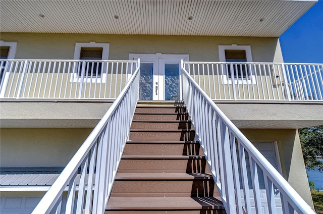 6801 Nowiki Ave, Hudson, FL 34667 - doorway to property with stucco siding