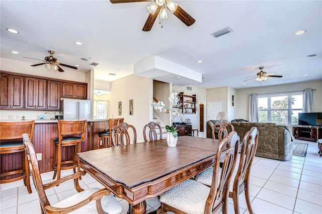 6801 Nowiki Ave, Hudson, FL 34667 - dining room with visible vents, ceiling fan, and light tile patterned floors