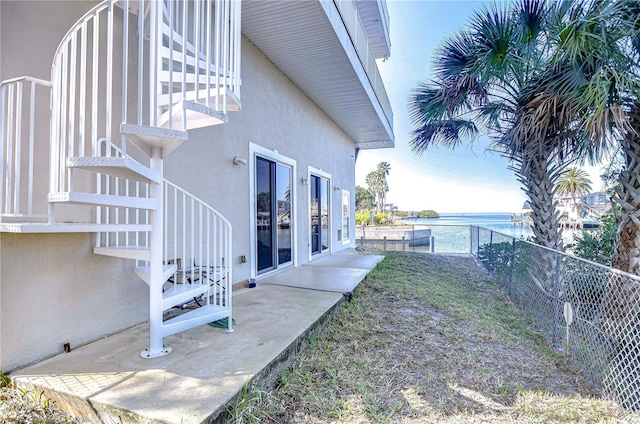 6801 Nowiki Ave, Hudson, FL 34667 - view of yard featuring fence, a water view, and a patio area