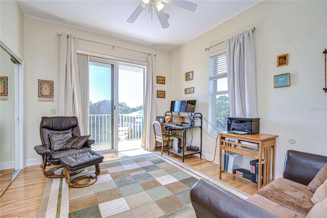 6801 Nowiki Ave, Hudson, FL 34667 - sitting room with ceiling fan, baseboards, wood finished floors, and plenty of natural light