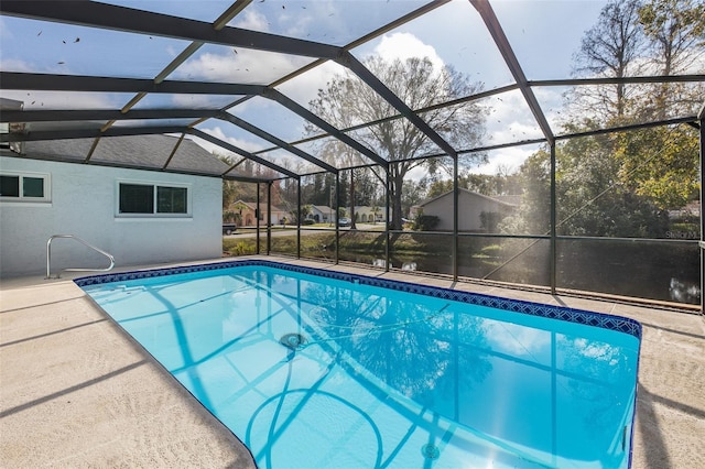 view of pool featuring a lanai