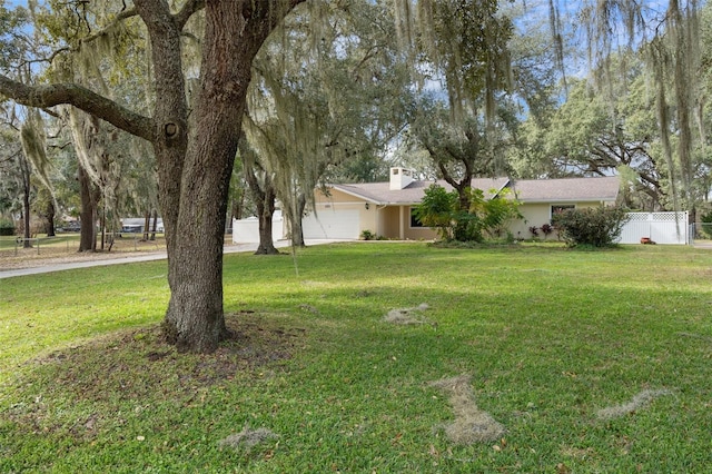 view of yard featuring a garage