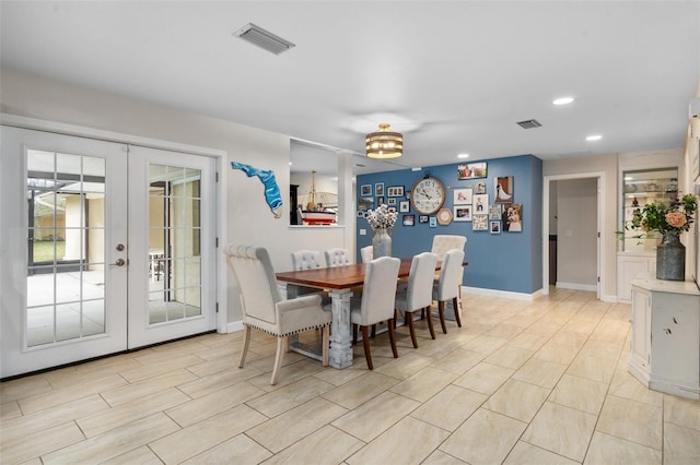 dining room featuring french doors