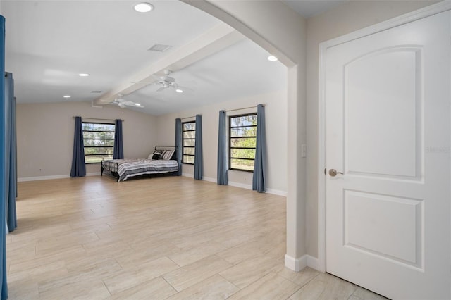 bedroom with ceiling fan, lofted ceiling with beams, and light wood-type flooring