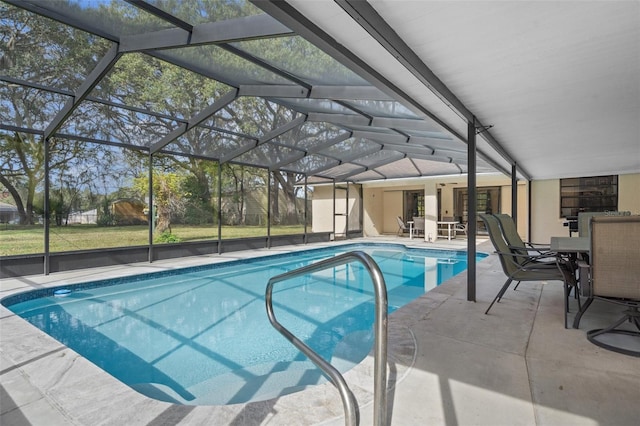 view of pool with a lanai and a patio area