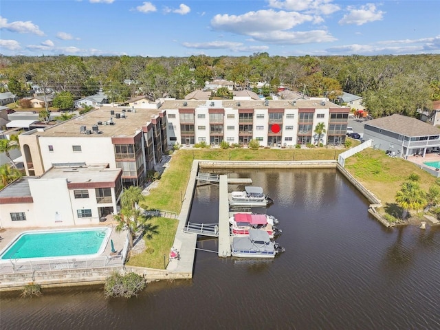 birds eye view of property with a water view