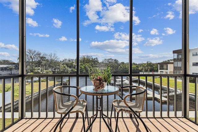 balcony featuring a water view