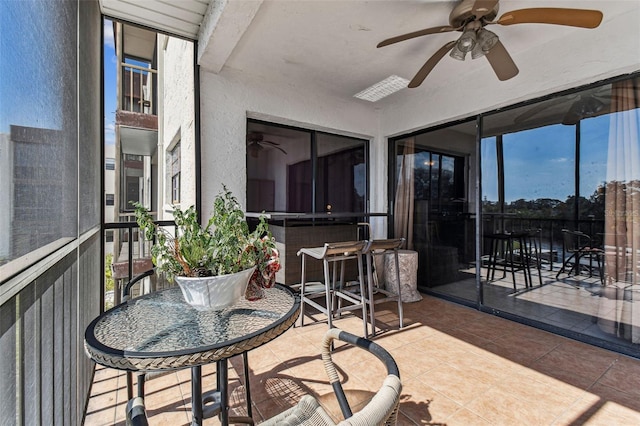 exterior space featuring ceiling fan