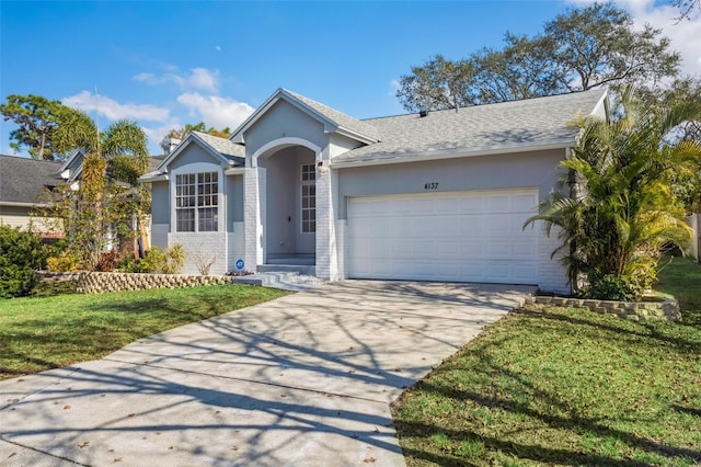 ranch-style house featuring a garage and a front yard