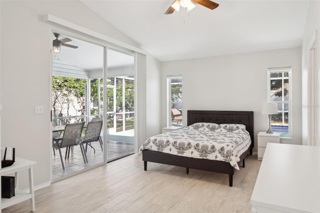 bedroom featuring ceiling fan, lofted ceiling, access to outside, and light hardwood / wood-style floors