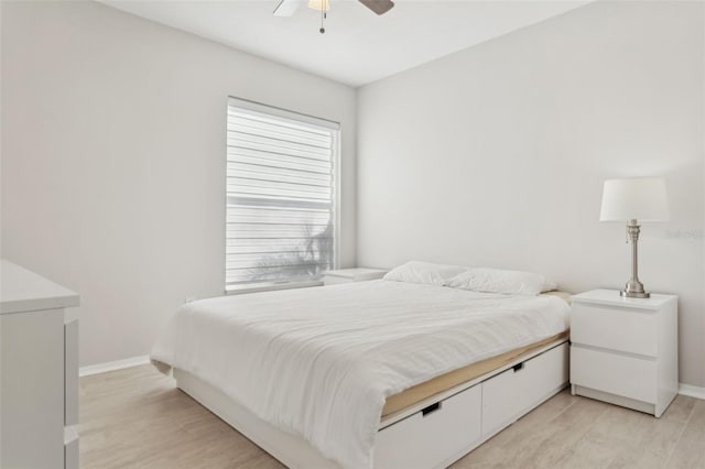 bedroom featuring ceiling fan and light wood-type flooring