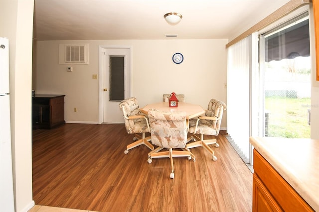 dining room with light wood-type flooring