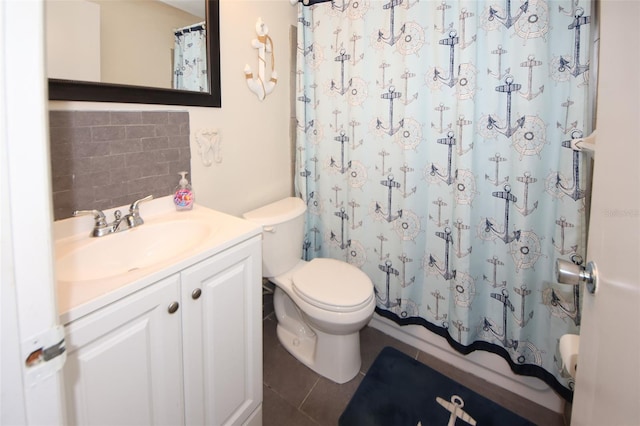 bathroom featuring vanity, decorative backsplash, curtained shower, and toilet