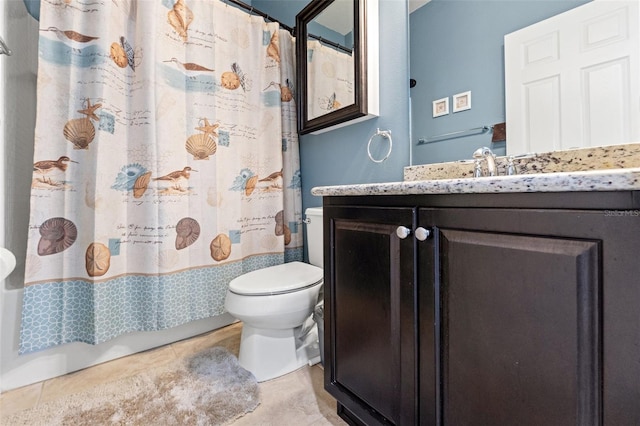 full bathroom with toilet, vanity, and a shower with curtain