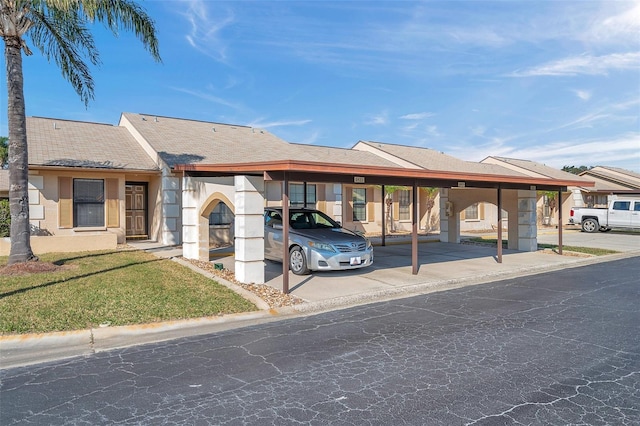 view of front of house with a carport