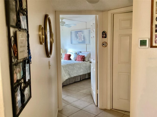 bedroom with light tile patterned floors
