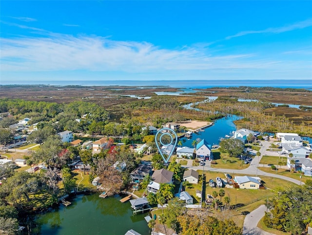 drone / aerial view featuring a water view