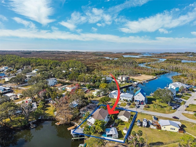 drone / aerial view with a water view