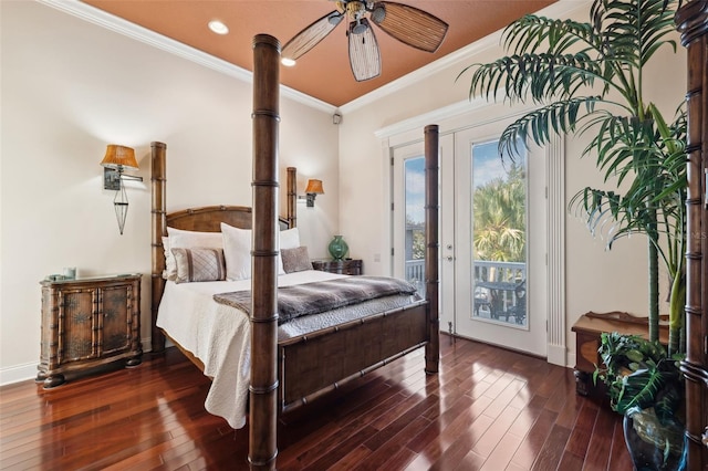 bedroom featuring dark wood-type flooring, crown molding, and access to outside