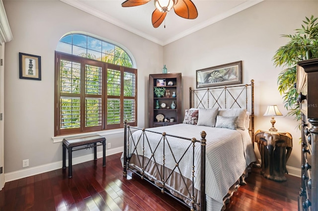 bedroom with ornamental molding, ceiling fan, and dark hardwood / wood-style flooring