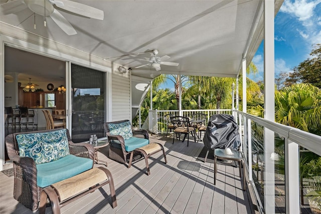 wooden terrace with ceiling fan