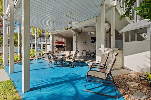 view of patio with ceiling fan