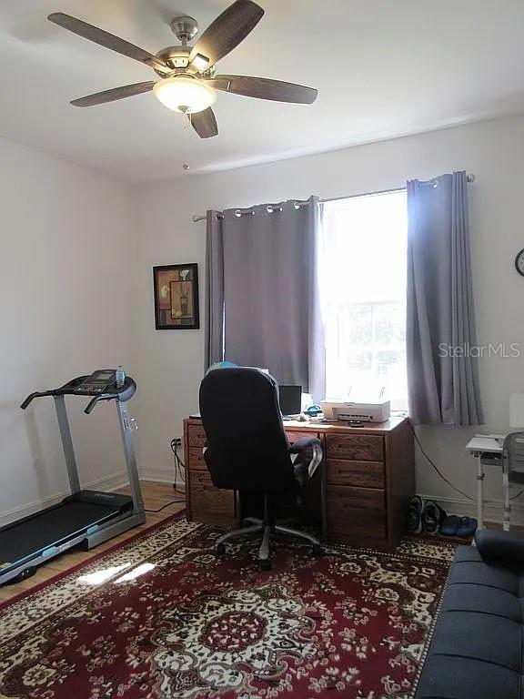 home office with ceiling fan