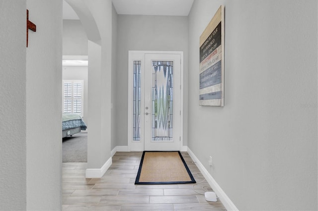 foyer with light wood-type flooring