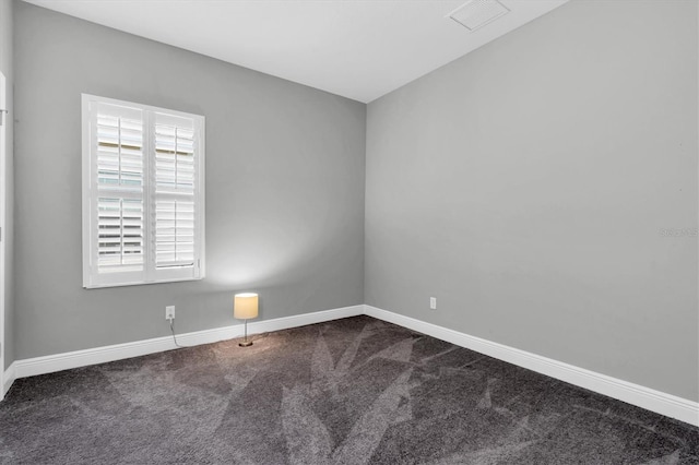 empty room featuring carpet floors