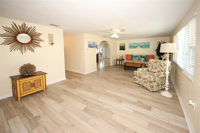 interior space with light hardwood / wood-style flooring and ceiling fan