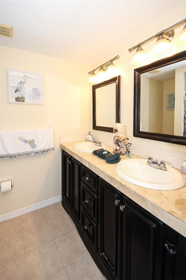 bathroom featuring vanity and tile patterned flooring