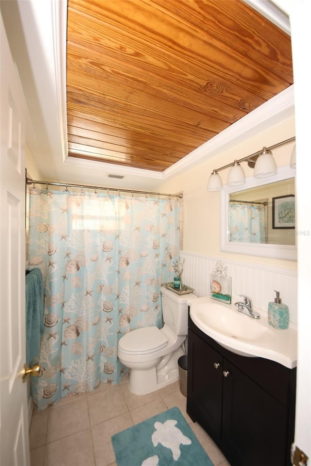 bathroom with tile patterned flooring, vanity, toilet, crown molding, and wooden ceiling