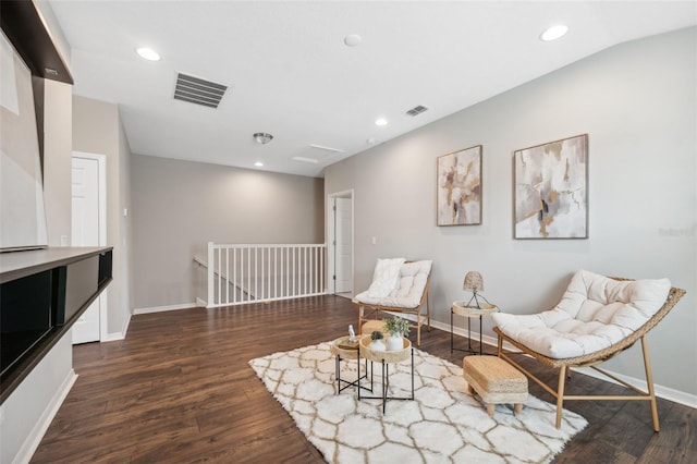 living area featuring dark wood-type flooring