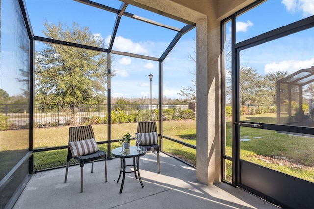 unfurnished sunroom with a healthy amount of sunlight