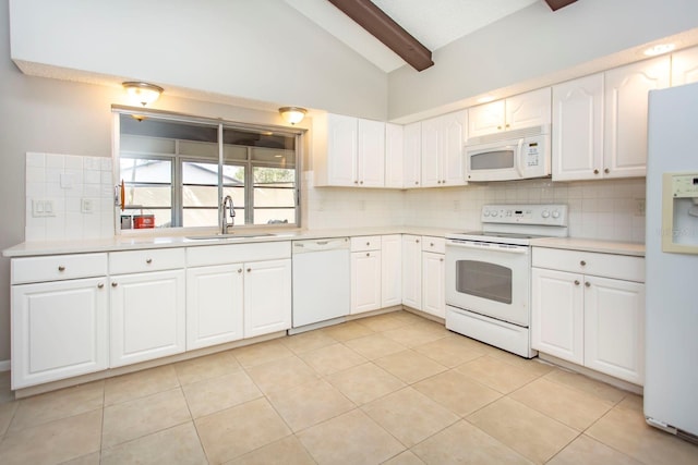 kitchen with sink, white appliances, white cabinetry, lofted ceiling with beams, and decorative backsplash