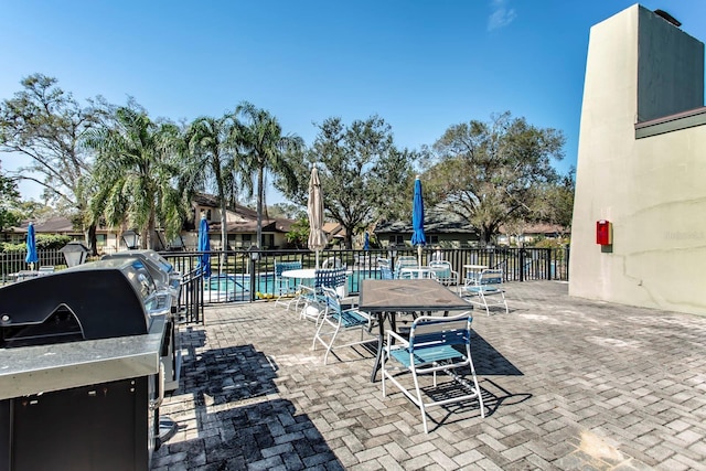 view of patio / terrace with a community pool