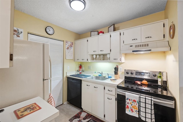 kitchen featuring stainless steel electric stove, black dishwasher, sink, white cabinets, and white refrigerator